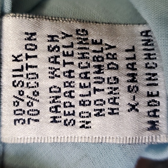 Blue Tassel collection silk Blend top. Blue with Black enbroidery. Size XS. - Picture 8 of 9